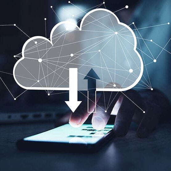 Man holding smart phone with cloud